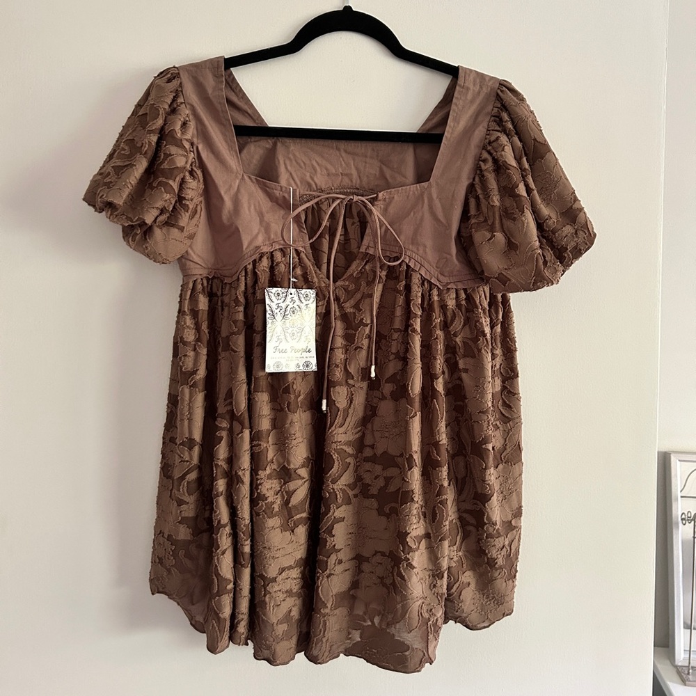 Free people brown polyester shirt. Never been worn